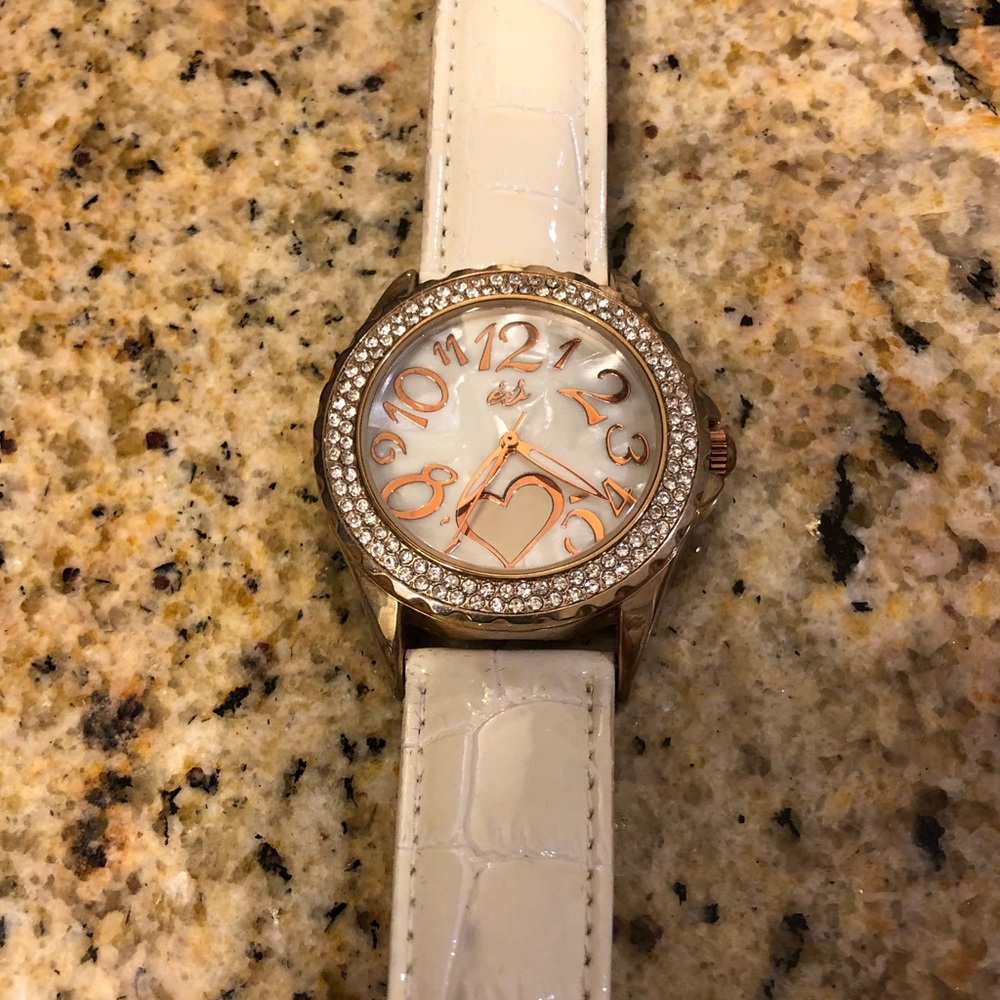 Cute watch with pearlescent face and faux diamonds